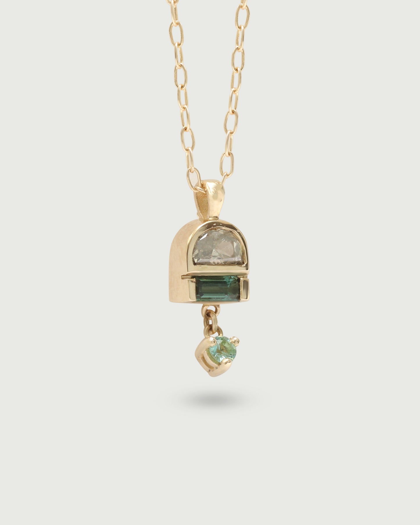 Side view of Monsoon Pendant in 14k yellow gold by Kestrel DIllon Side view of Monsoon Pendant in 14k yellow gold by Kestrel DIllon