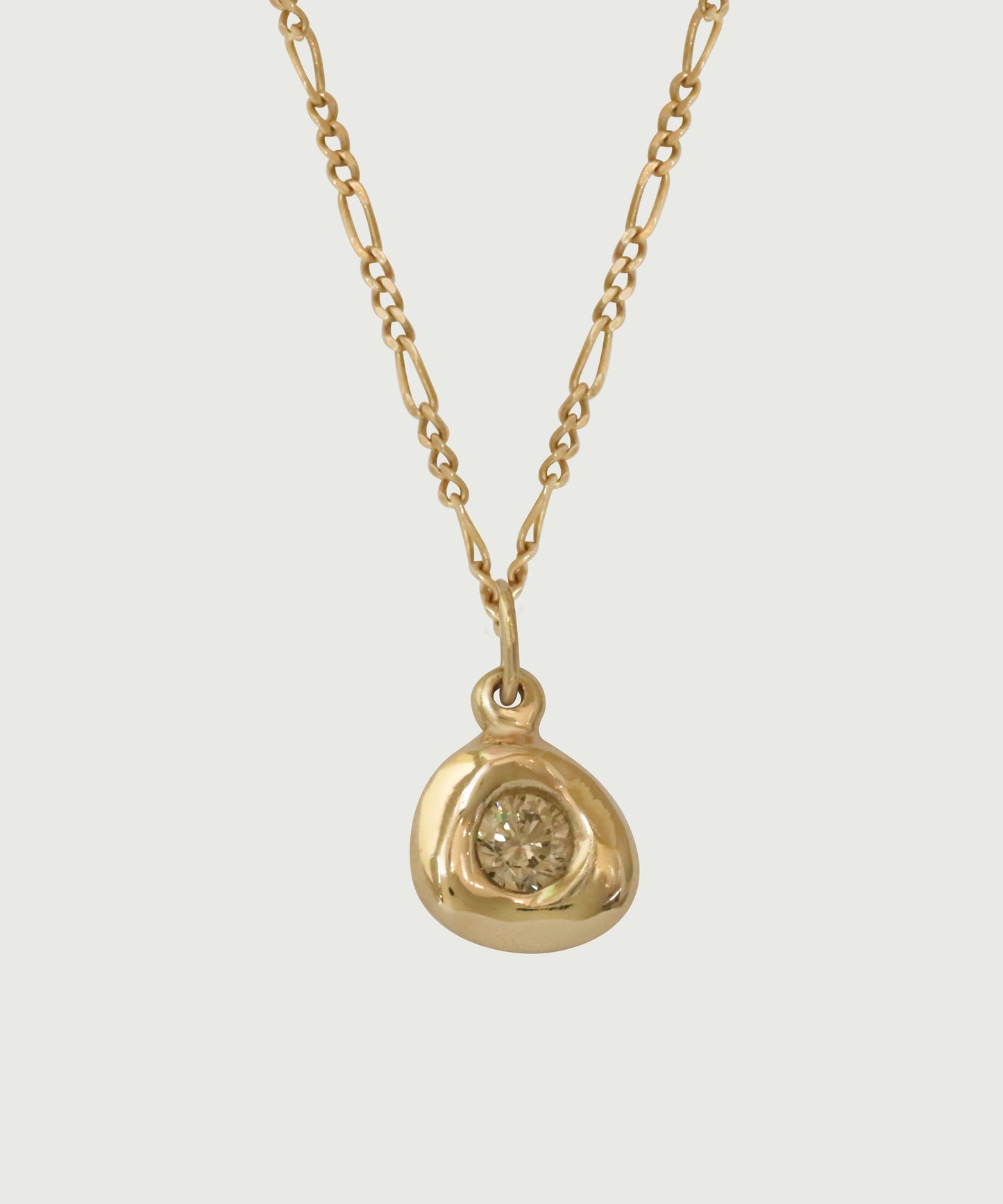 Side view of Star Jelly Pendant with Champagne Diamond by Kestrel Dillon in 14k yellow gold Side view of Star Jelly Pendant with Champagne Diamond by Kestrel Dillon in 14k yellow gold