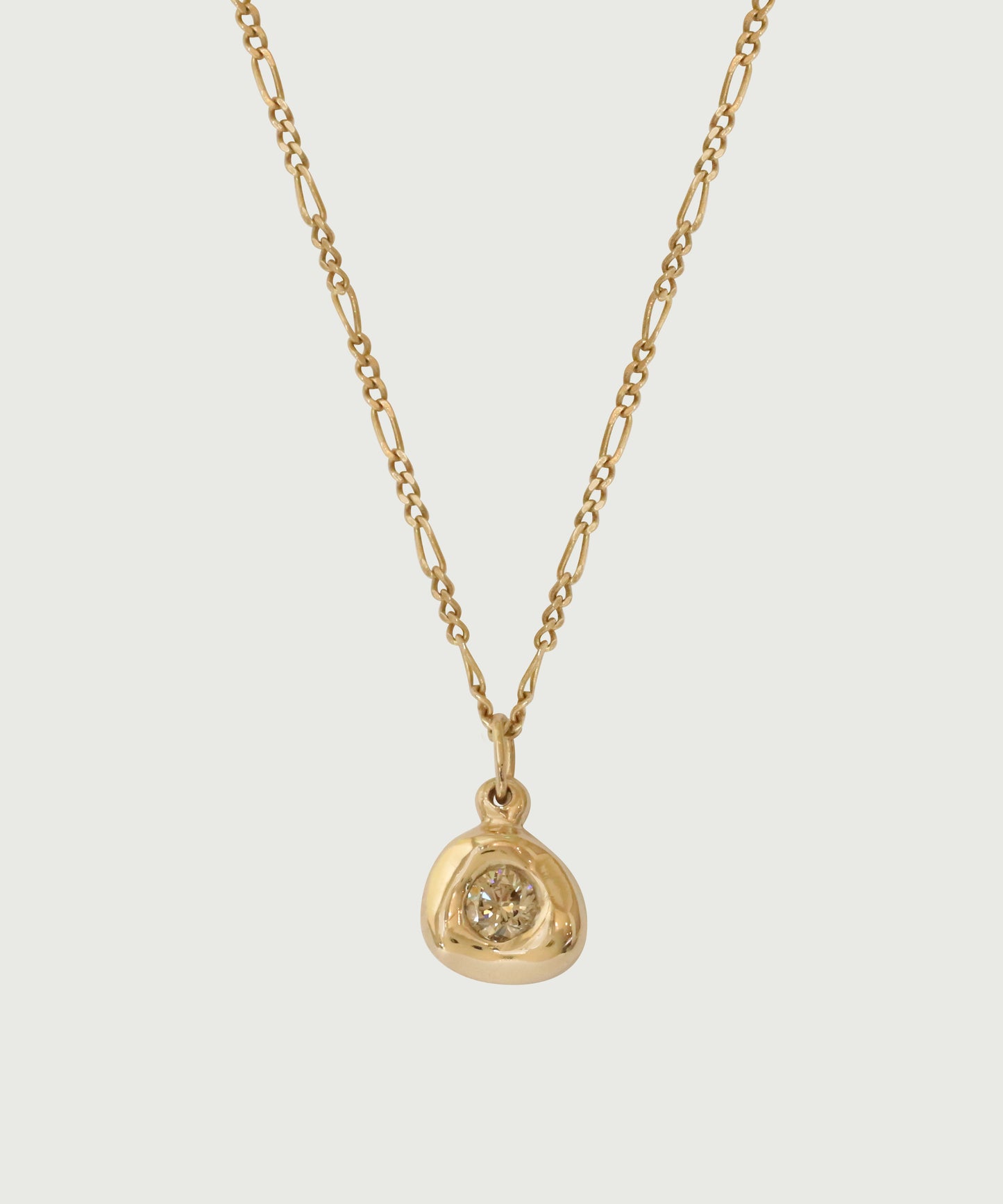 Farther front view of Star Jelly Pendant with Champagne Diamond by Kestrel Dillon in 14k yellow gold Farther front view of Star Jelly Pendant with Champagne Diamond by Kestrel Dillon in 14k yellow gold