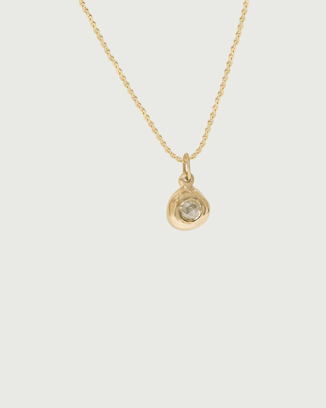 Side view of Star Jelly Pendant with Rose Cut Diamond in 14k yellow gold by Kestrel Dillon Side view of Star Jelly Pendant with Rose Cut Diamond in 14k yellow gold by Kestrel Dillon
