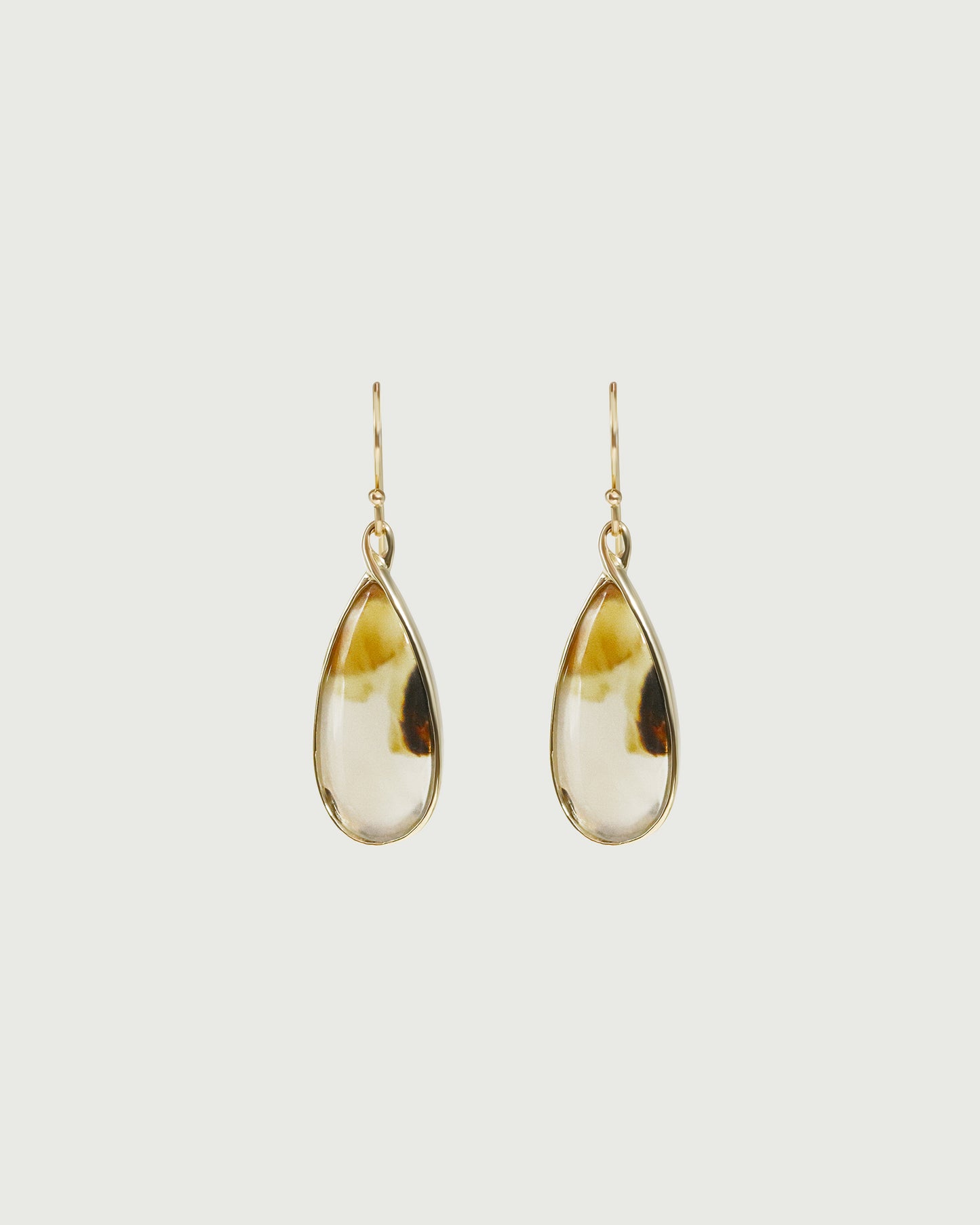Front view of Montana Agate Earrings in 14k yellow gold by Kestrel Dillon Front view of Montana Agate Earrings in 14k yellow gold by Kestrel Dillon