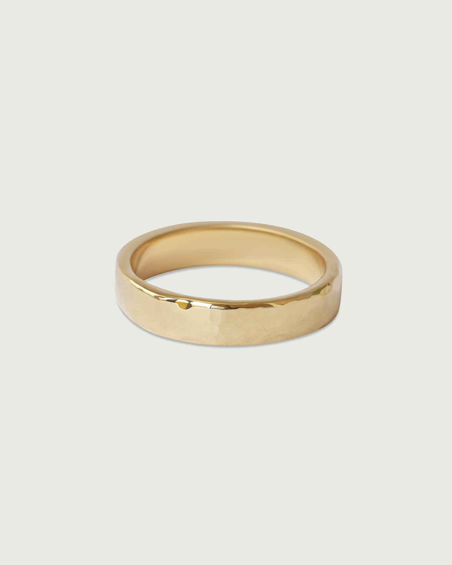 Side view of 4.5mm Hammered Band in 14k Yellow Gold Side view of 4.5mm Hammered Band in 14k Yellow Gold