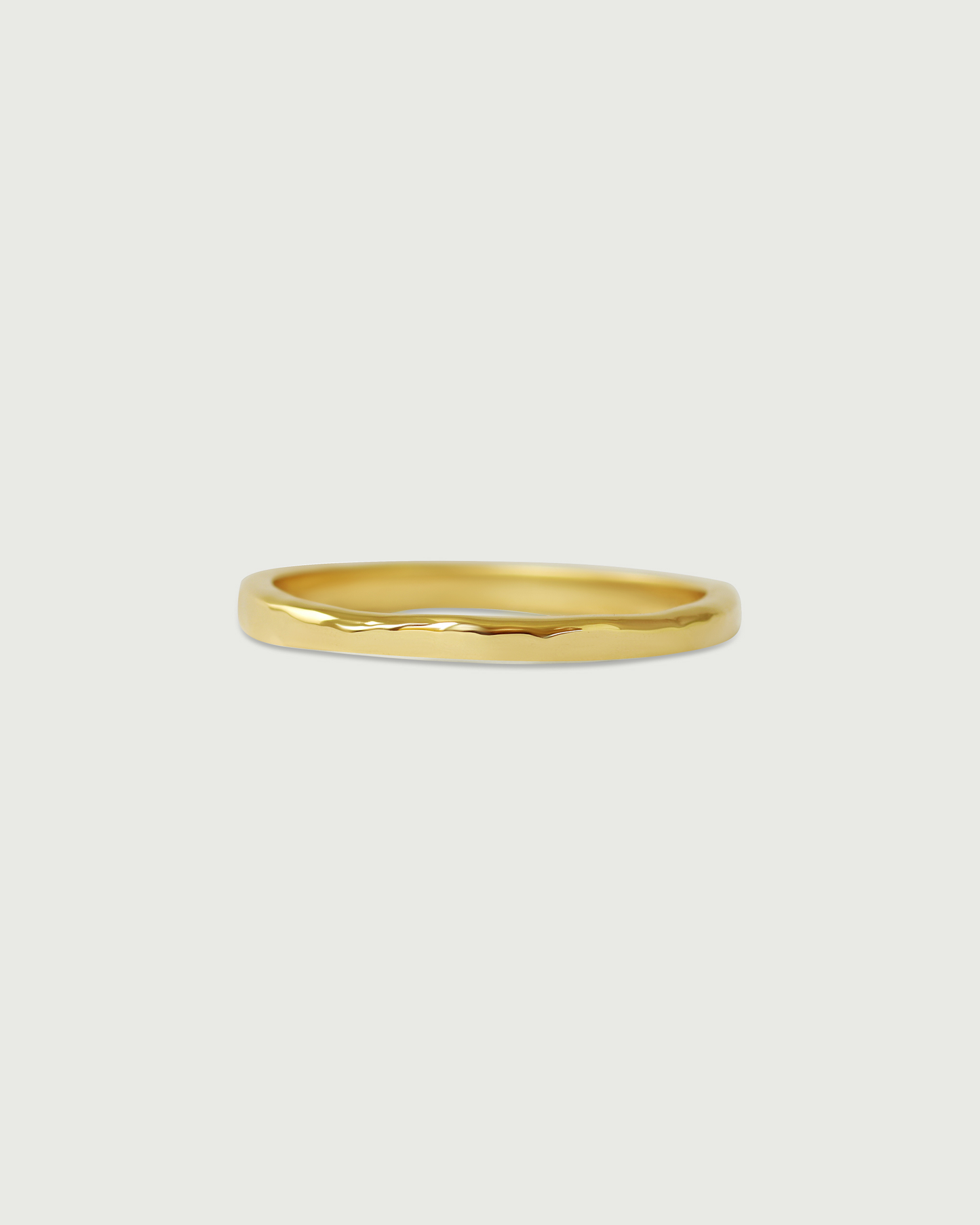 Front view of 2mm Hammered Band in 18k Yellow Gold Front view of 2mm Hammered Band in 18k Yellow Gold