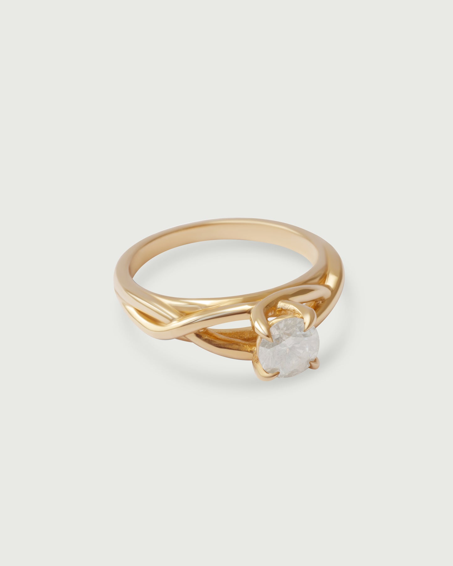 Side view of Twist Solitaire Ring in 14k yellow gold by Kestrel Dillon Side view of Twist Solitaire Ring in 14k yellow gold by Kestrel Dillon