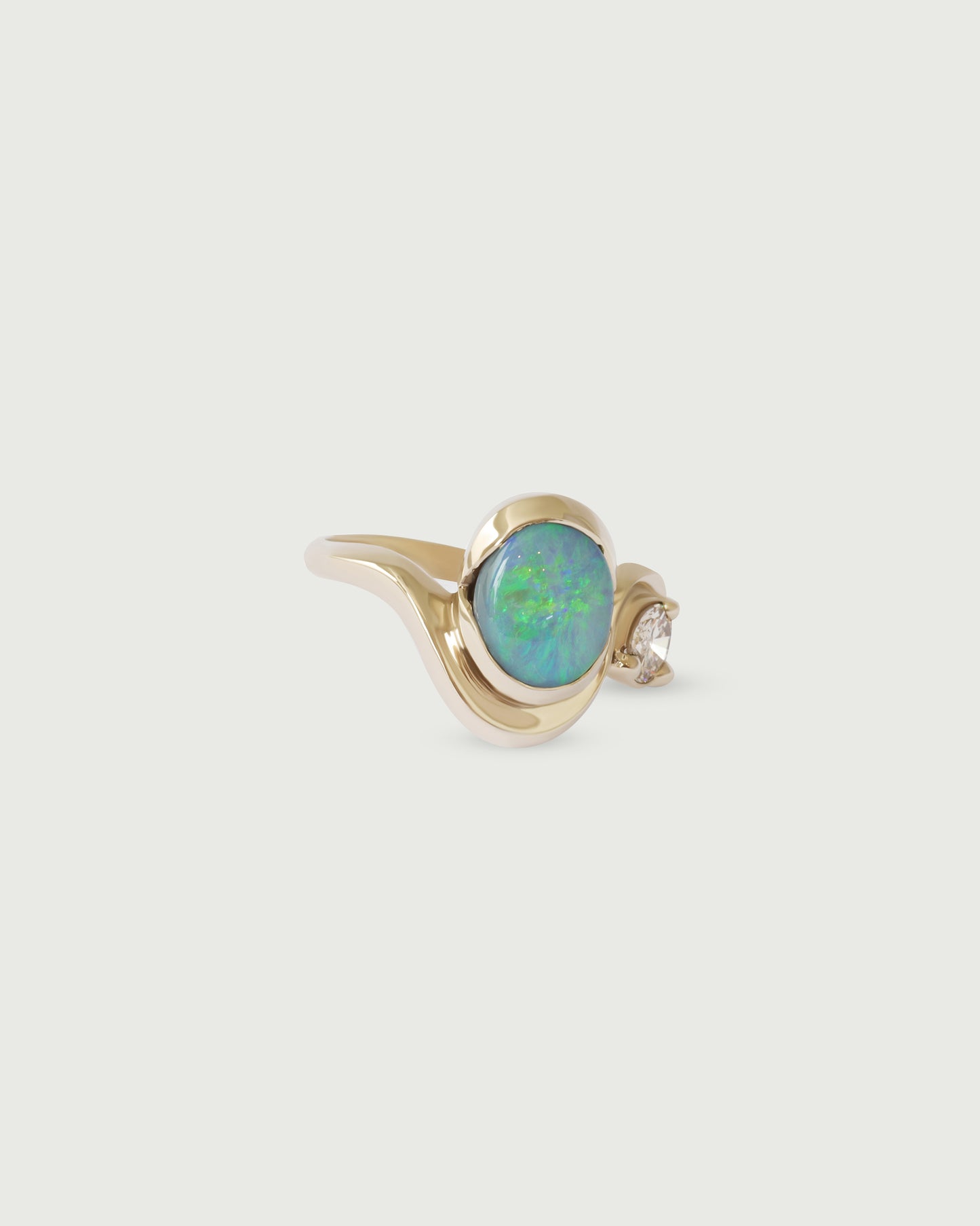 Side view of Opal Curve Ring in 14k white gold Side view of Opal Curve Ring in 14k white gold