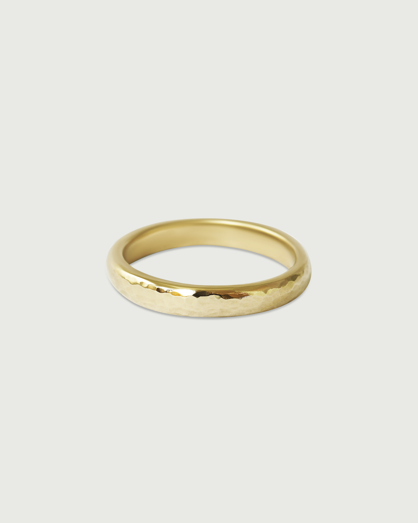 Side view of 3mm Hammered Band in 14k Yellow Gold Side view of 3mm Hammered Band in 14k Yellow Gold