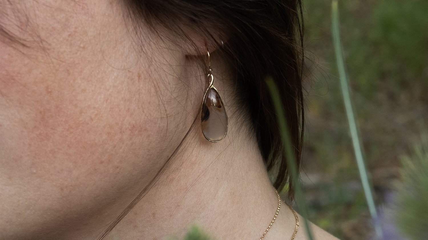 Model wears Cicada Hoops in Sterling Silver