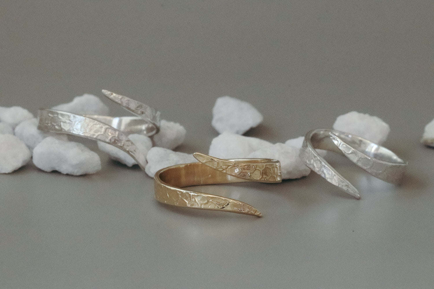 Three Snake Spiral Rings in 14k yellow gold, 14k white gold, and Sterling Silver