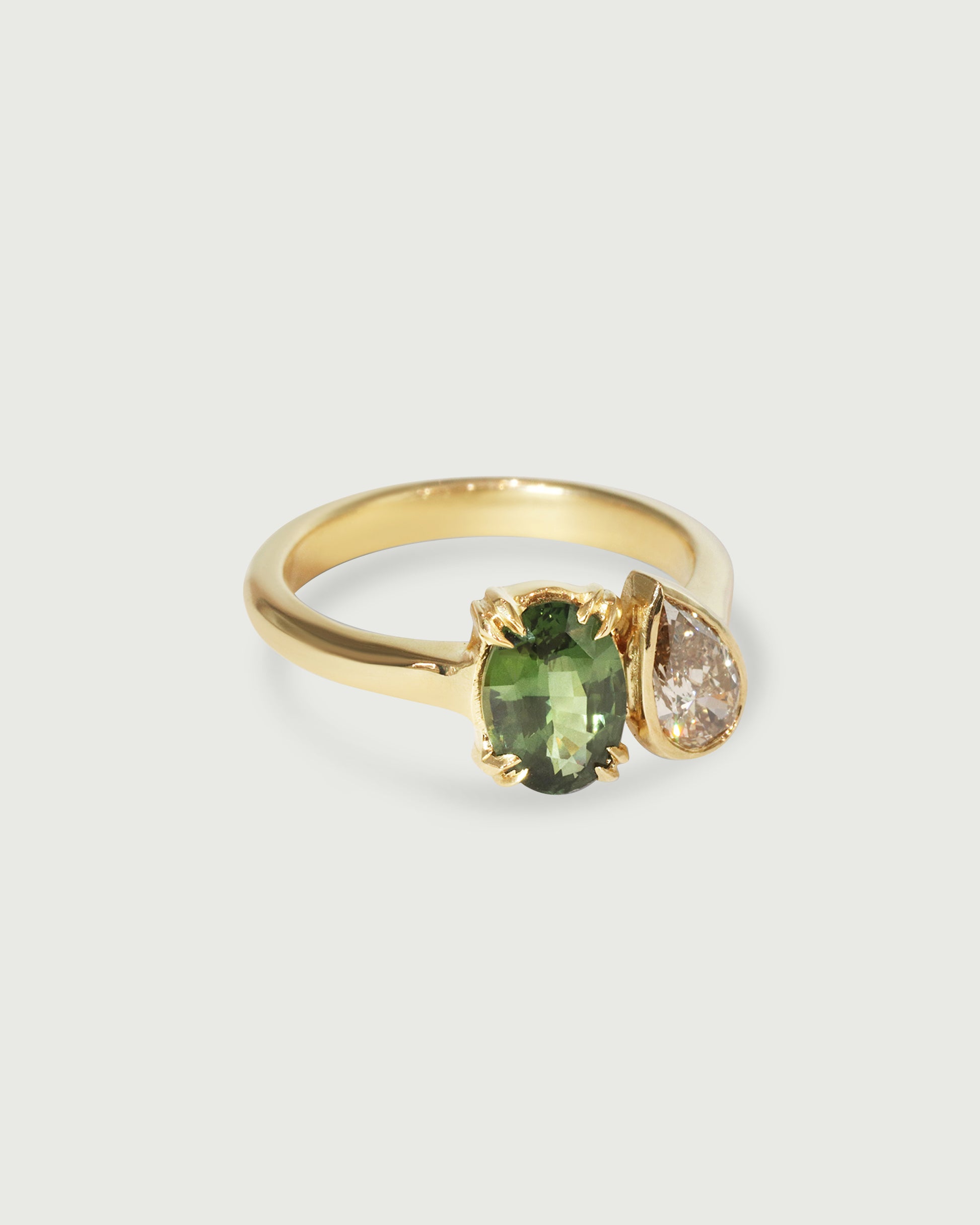Side view of Oval & Pear Toi et Moi Ring in 18k yellow gold