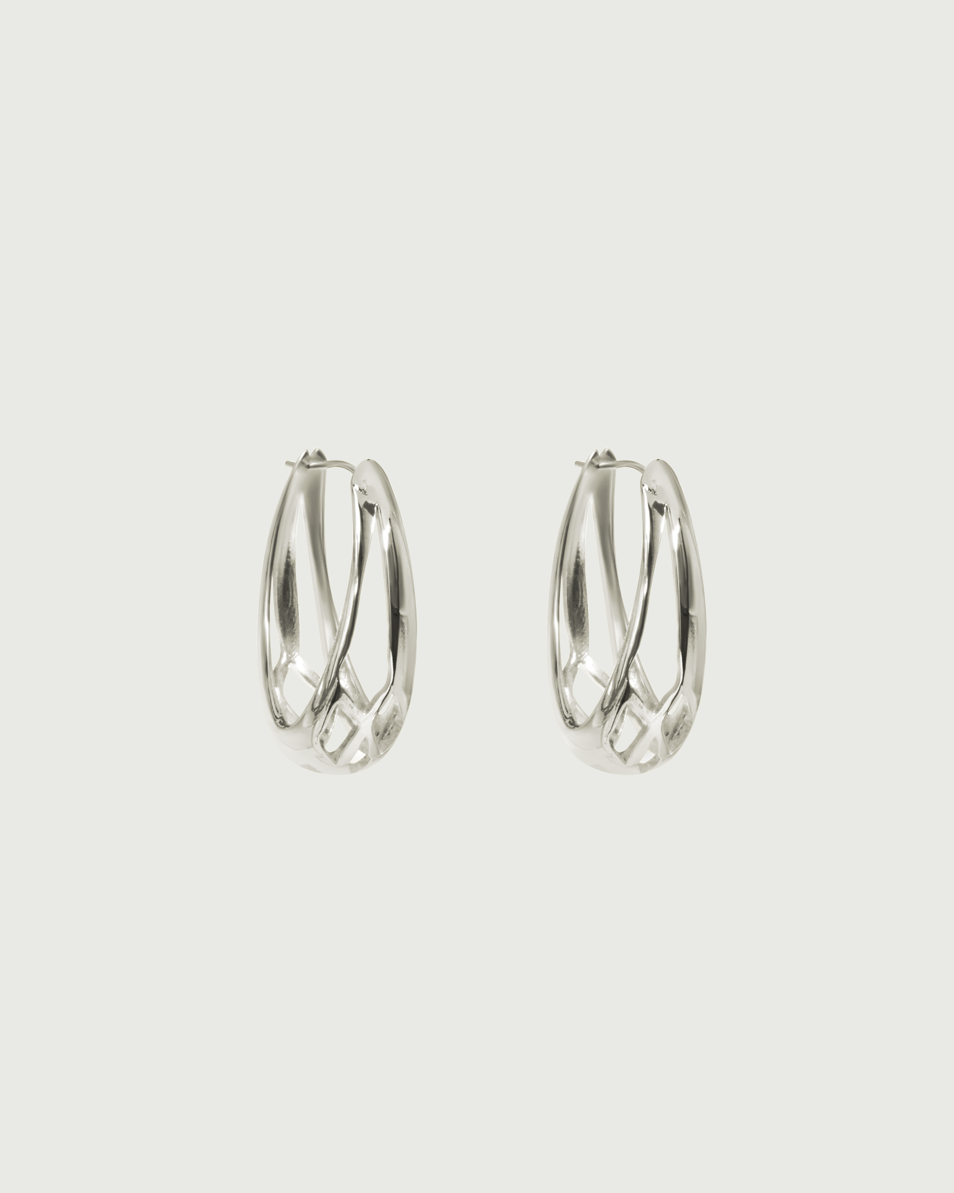 Side view of Cicada Hoops in 14k white gold