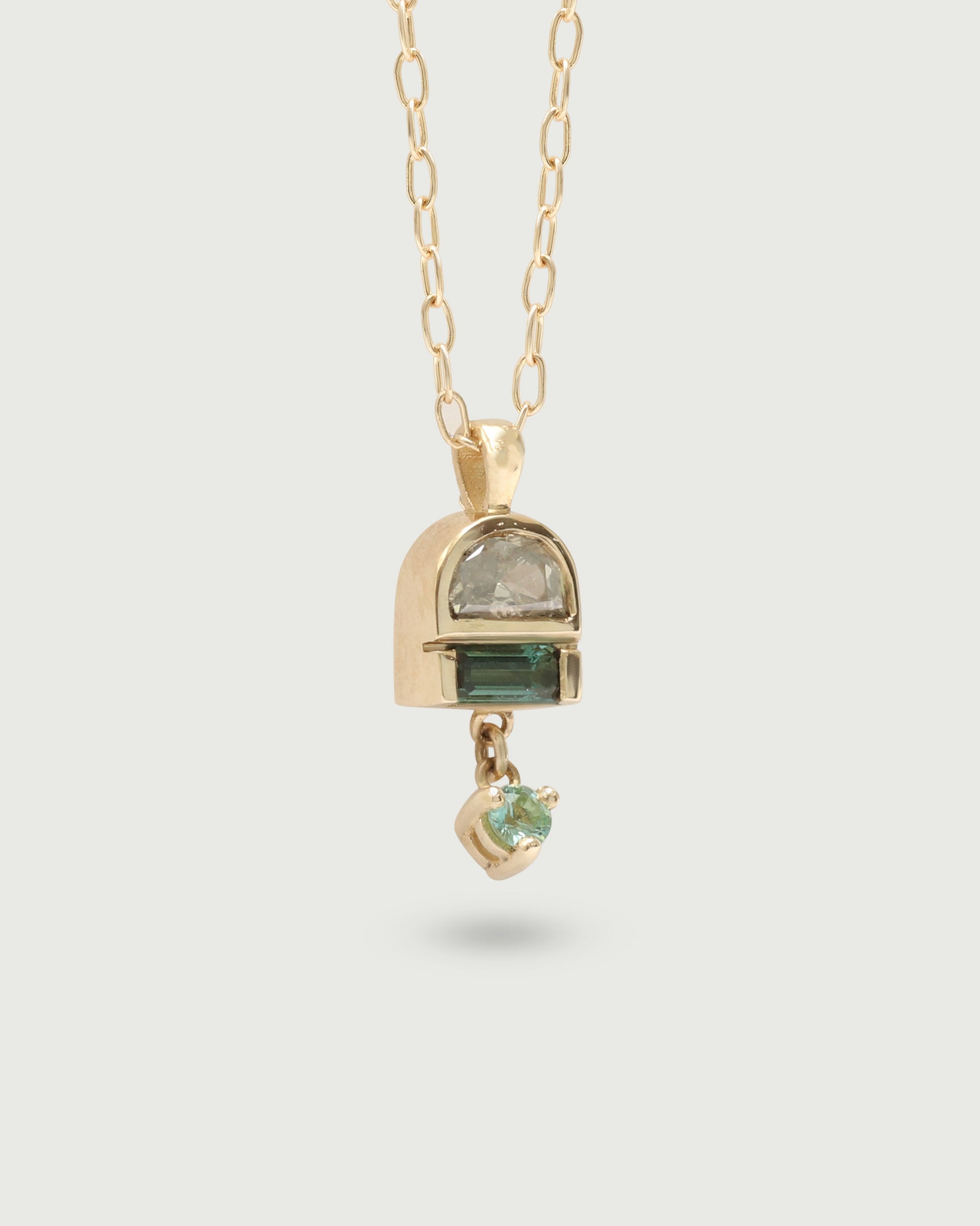 Side view of Monsoon Pendant in 14k yellow gold by Kestrel DIllon