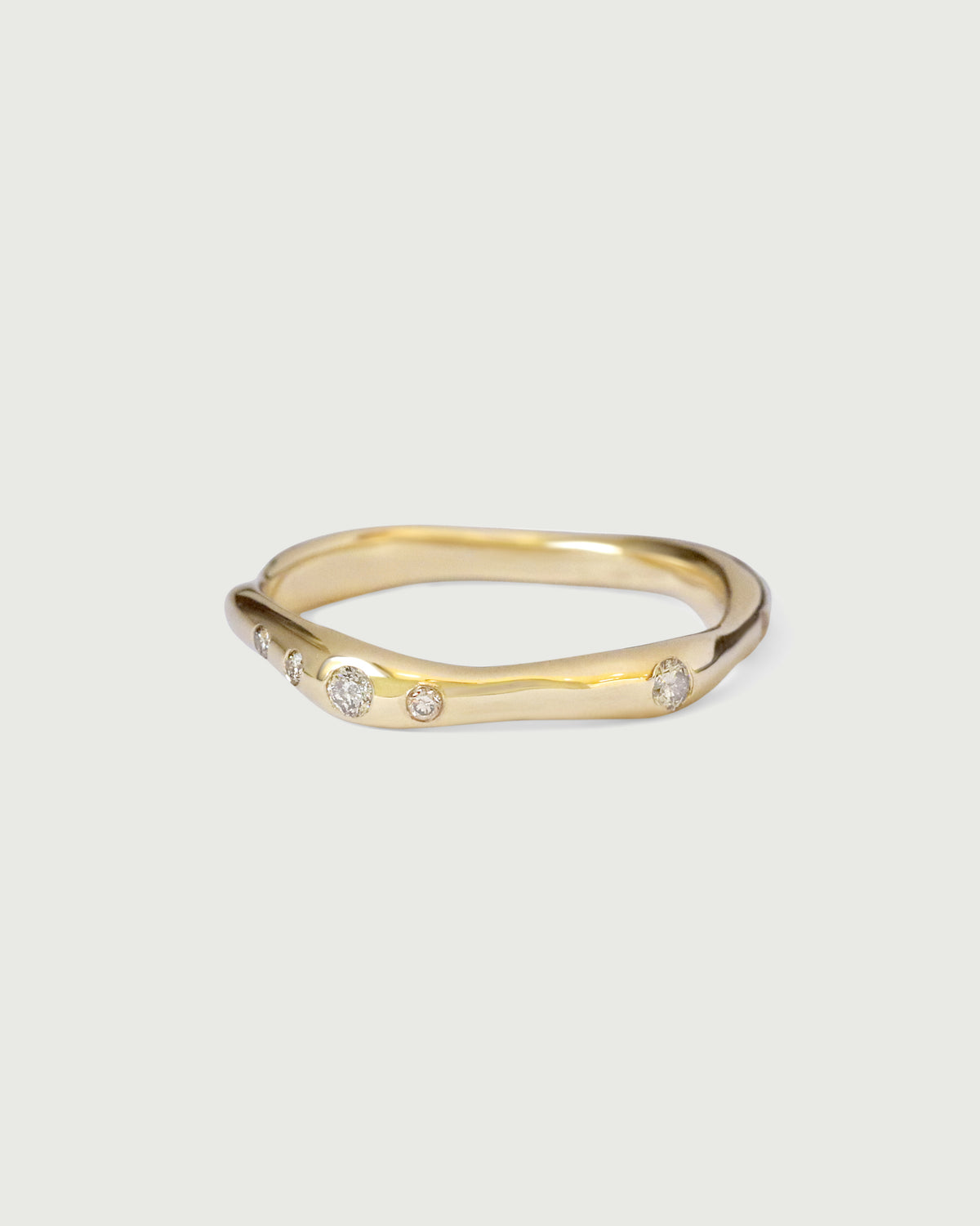 Front view of Drizzle Band in 14k Yellow Gold by Kestrel Dillon