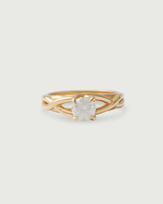 Front view of Twist Solitaire Ring in 14k yellow gold by Kestrel Dillon